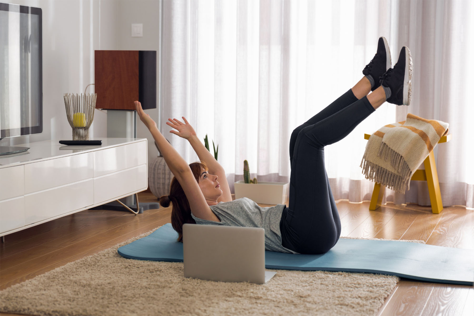 Lady doing a workout at home