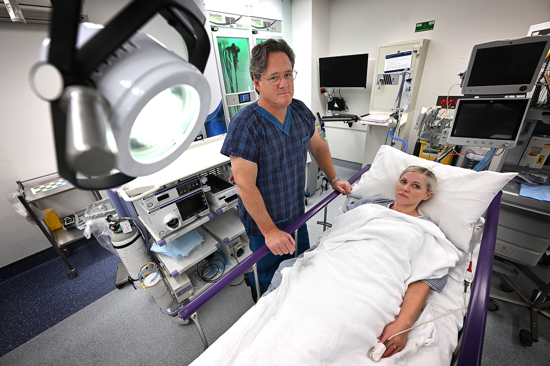 Kristina lying in a hospital bed