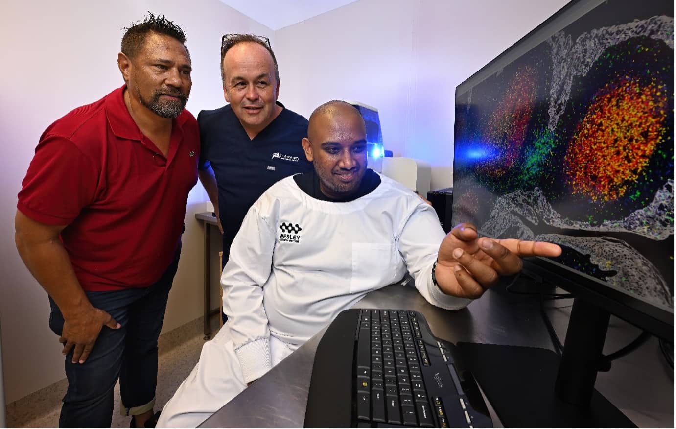 Michel Itel with Clinical Director of the Queensland Spatial Biology Centre, Dr John Fraser and Scientific Director Dr Arutha Kulasinghe